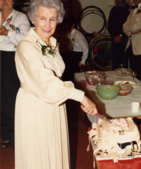 July 1982 Rebecca Coulter cutting 25th Anniversary Cake
